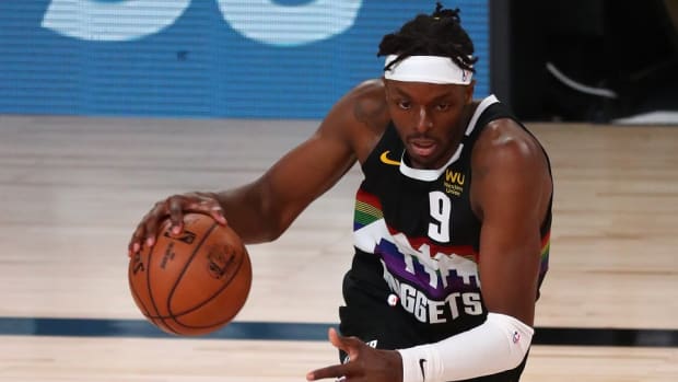 Denver Nuggets forward Jerami Grant dribbles upcourt against the Los Angeles Lakers during the Western Conference Finals of the 2020 NBA Playoffs at AdventHealth Arena.